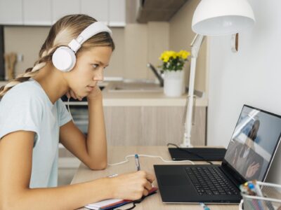 portrait-girl-paying-attention-online-class-scaled